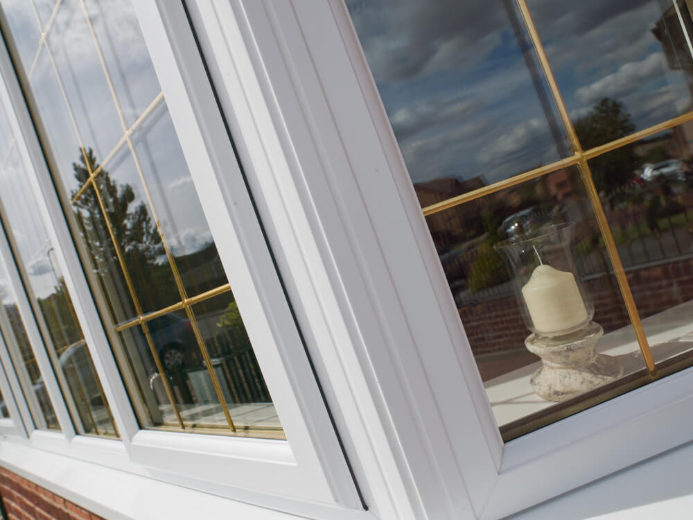 liniar white upvc bay window close up