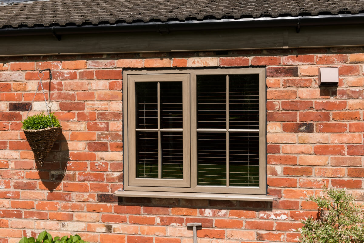 Modus upvc flush wood effect window on barn