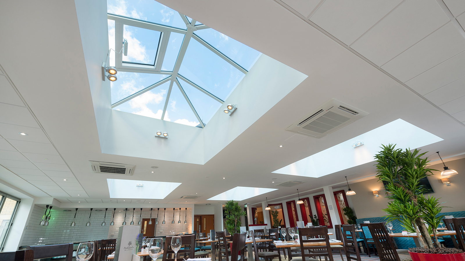 internal view of white roof lanterns in restaurant